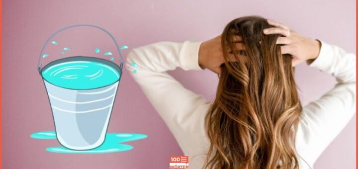 Eine Frau fässt sich in die Haare, daneben steht ein Eimer mit Wasser. Symbolbild für die Erklärung und Herkunft des Sprichworts Wasch mir den Pelz, aber mach mich nicht nass.